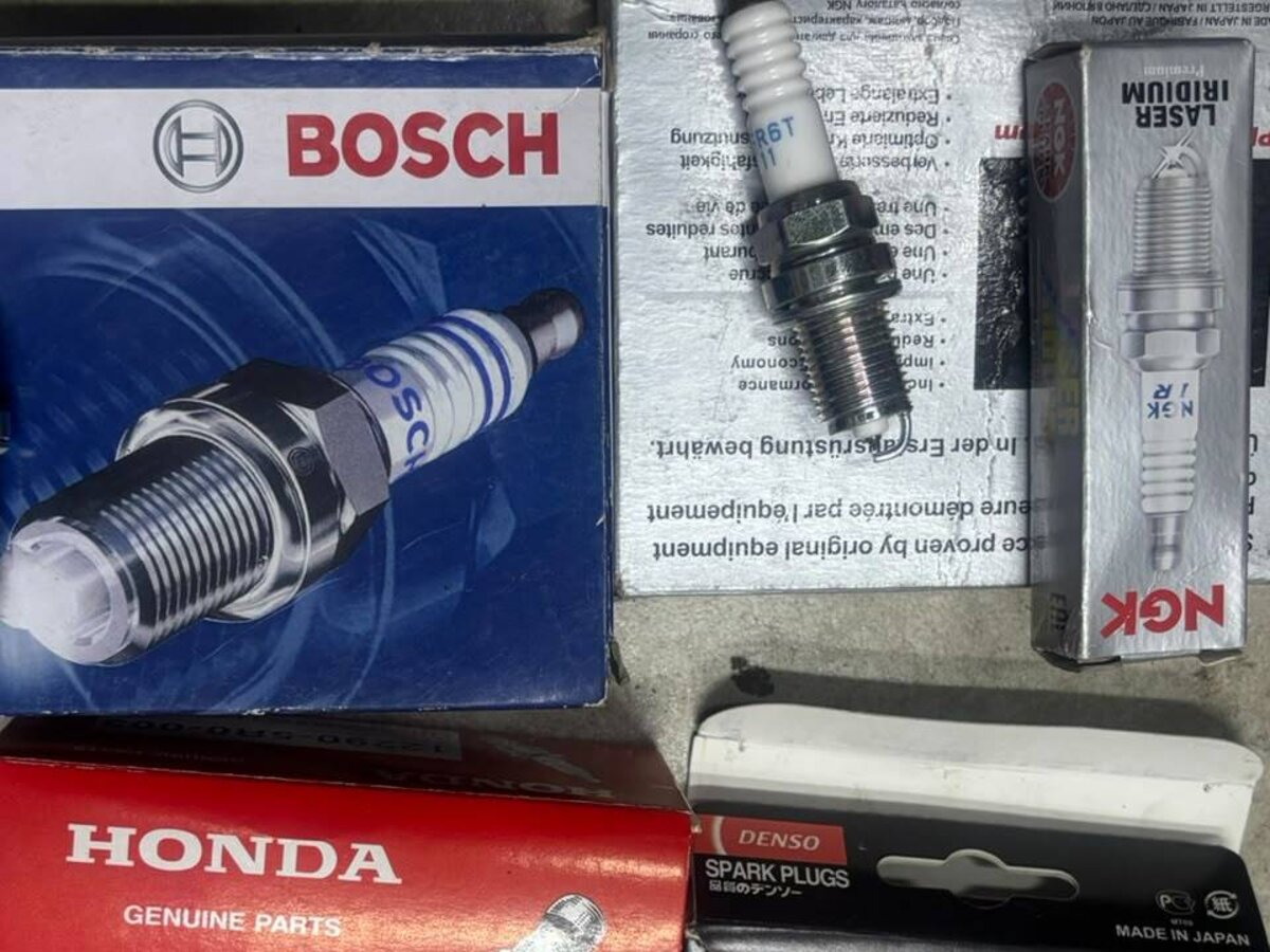 Bosch, NGK, Honda and Denso spark plug boxes